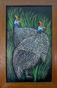 "Two Guinea fowls on leather"