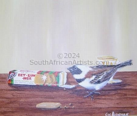 Sparrow feasting on Eet-Sum-More Biscuits