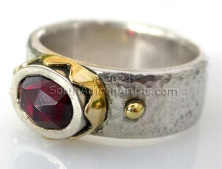 Silver, 18ct crown ring with garnet