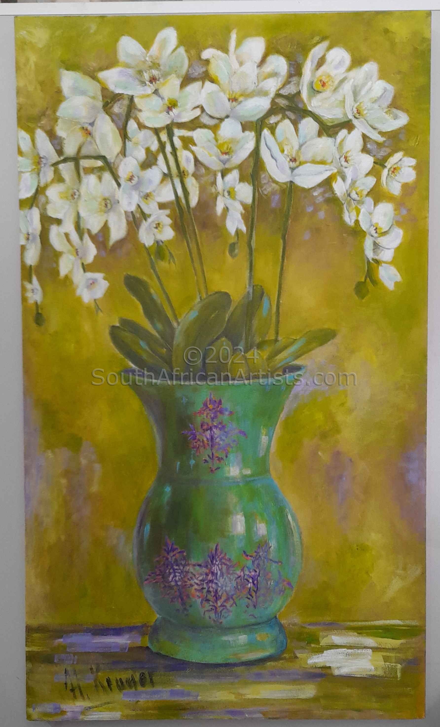 Orchids in green vase