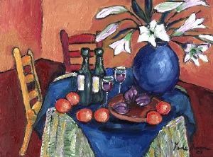 "Round table with vase of lilies"