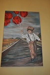 "Little boy with baloons"