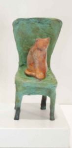 "Sitting Cat On Chair"