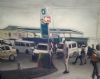 "People by BP Garage"