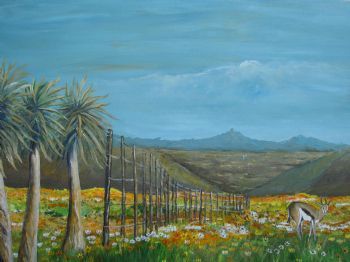 "A Buck Grazing Among the Flowers in the Field "