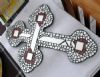 "small cross"