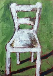 "White Chair with Green Background"